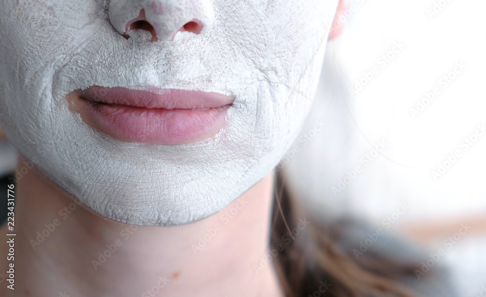 Clay mask on a woman's face. Close-up lips and chin. Stock Photo | Adobe  Stock
