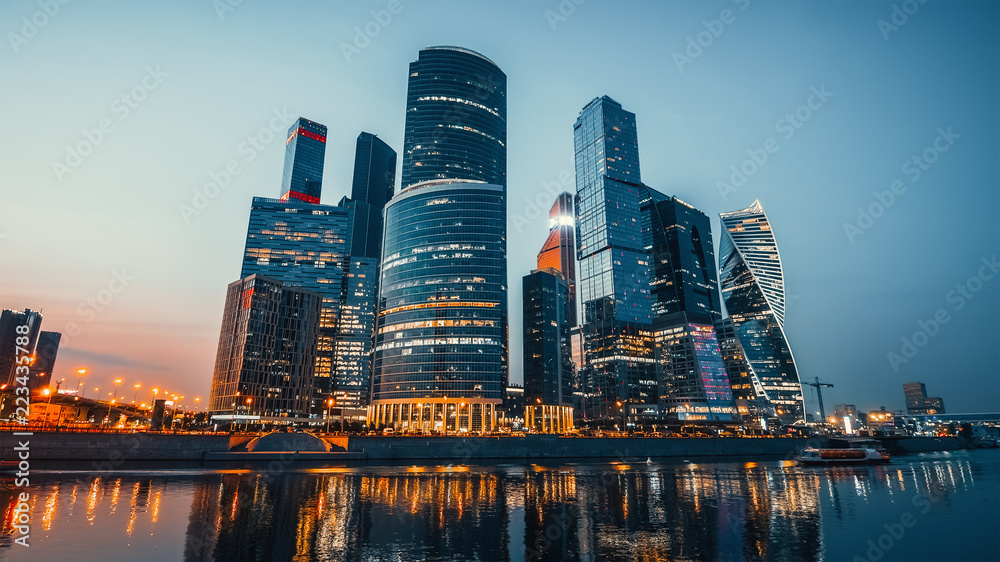 Panoramic view of Moscow city and Moskva River after sunset. New modern futuristic skyscrapers of Moscow-City - International Business Center - obrazy, fototapety, plakaty 