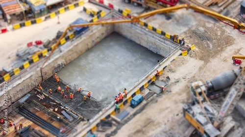Aerial Big Construction Site Working 4K Time Lapse Tilt-Shift (zoom out)