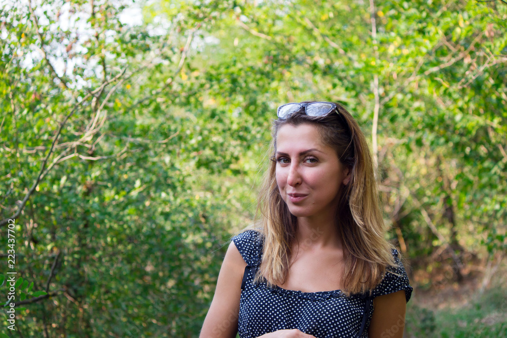 spring portrait of a beautiful girl in nature. spring portrait of a beautiful girl in nature.