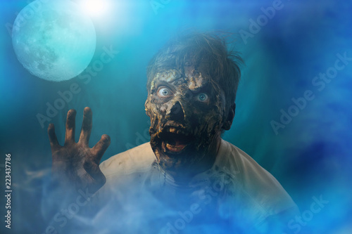 scary zombie closeup on dark Halloween background