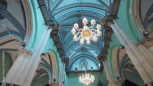 Hebron, Al Khalil, Palestine, West Bank. Wide shot, panoramic pan right inside the Ibrahimi Mosque, Al Haram Al Ibrahimi, The Cave of the Patriarchs, ceiling light and decoration. 4K footage photo