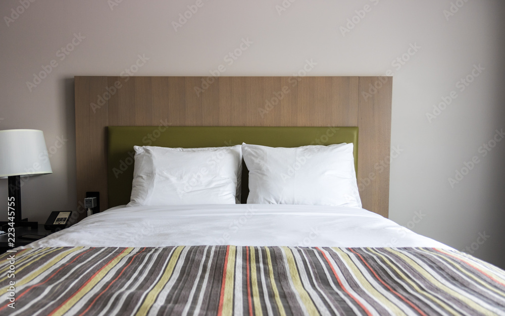 Elegant hotel bedroom, copy space image Elegant hotel bedroom, copy space image