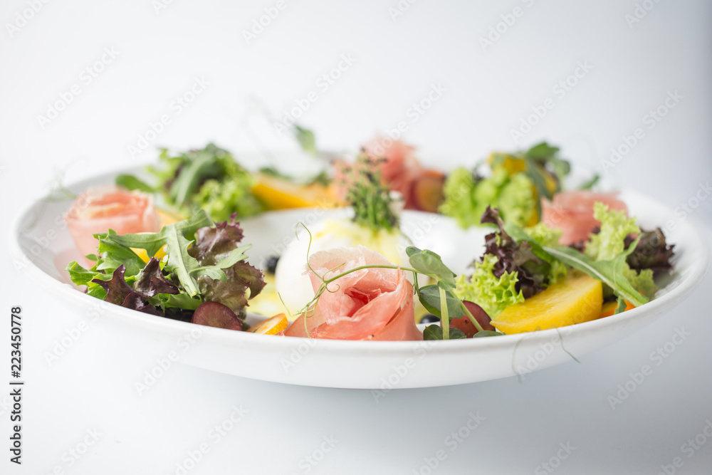 Fresh salad with jamon and green lettuce Fresh salad with jamon and green lettuce