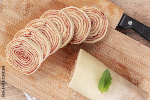 Bolo de rolo (swiss roll, roll cake) typical Brazilian dessert. photo