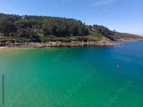  Aerial photo double canoe drone in crystal clear green sea water © Nedrofly