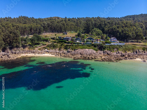  Aerial view of a beach with crystal clear water. Top view of beauty nature landscape with a tropical beach, top view