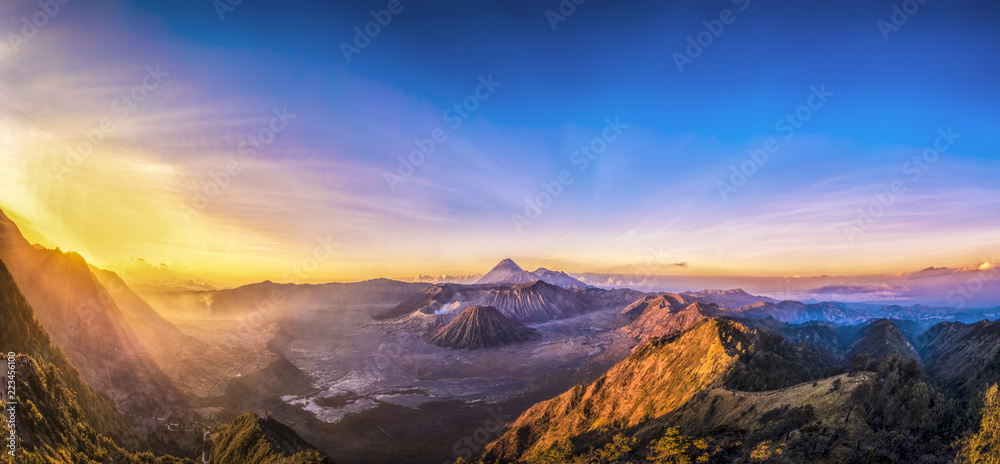 Panorama of Mount Bromo volcano (Gunung Bromo) during sunrise in East Java, Indonesia.