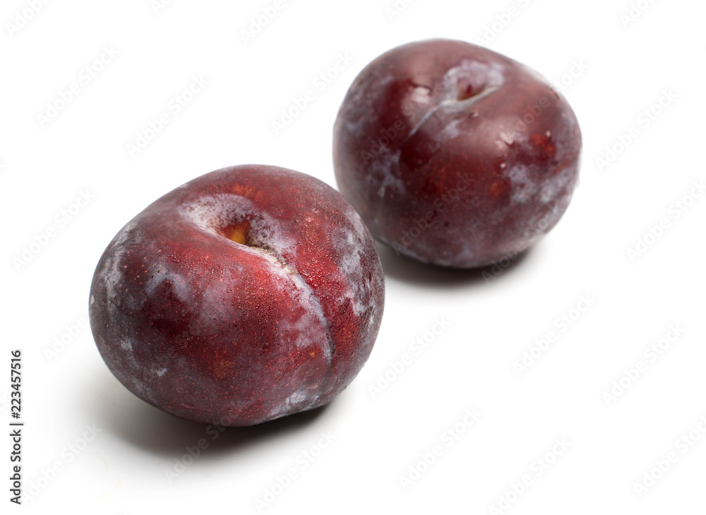 red plum fruit isolated on white