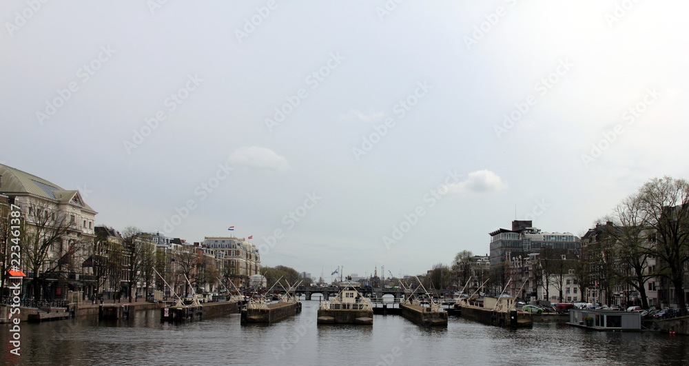 Amsterdam in April, 2016. Netherlands. Amsterdam cityscape with houseboats.