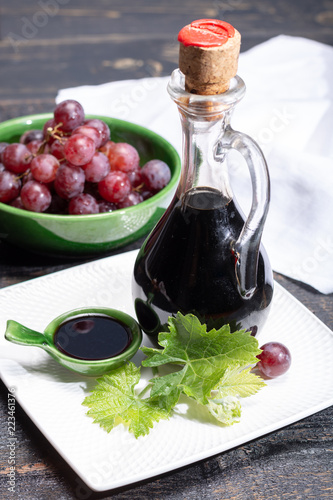 Black aged natural balsamic vinegar dressing from Modena, Italy