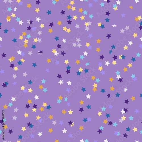 pattern of colored confetti in the shape of stars