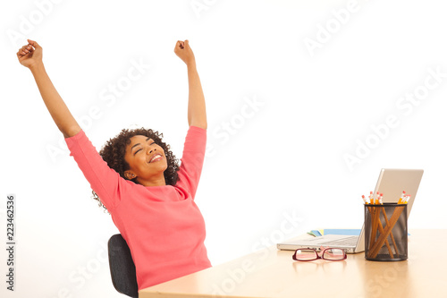 Happy millennial black businnesswoman finished with work on notebook computer photo