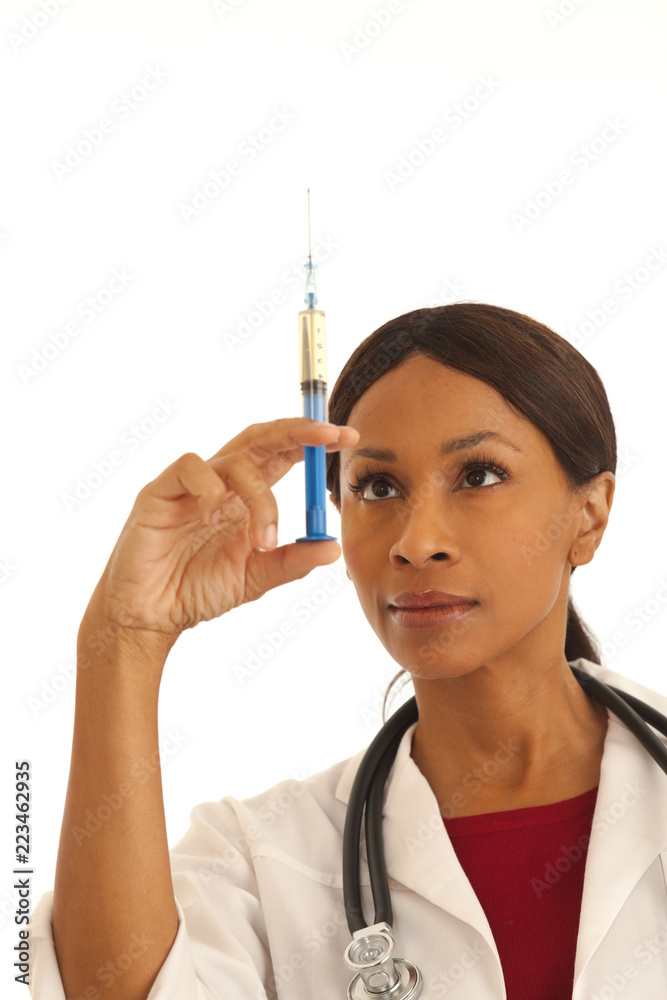 Close up of young female medical doctor holding syringe injection Close up of young female medical doctor holding syringe injection
