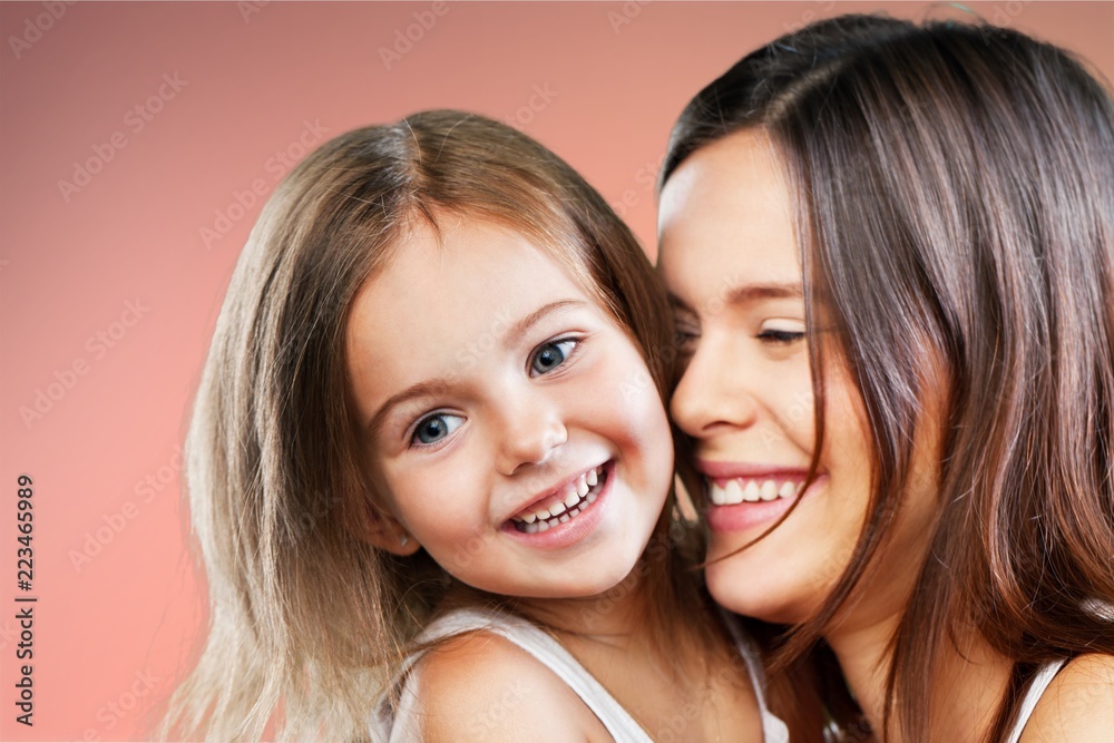 Happy Mother and daughter hugging Happy Mother and daughter hugging