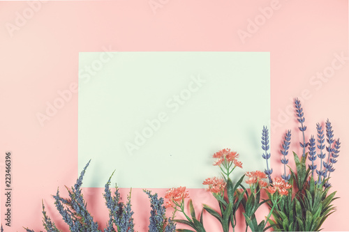 Pink background with flowers and text space