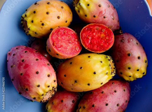 Prickly pear cactus colorful fresh ripe fruits in bowl. Opuntia fichi d'india photo