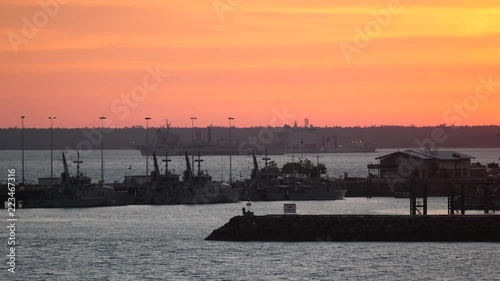 Naval Dockyard HMAS Coonawarra, International Naval vessels visible in harbor and background photo