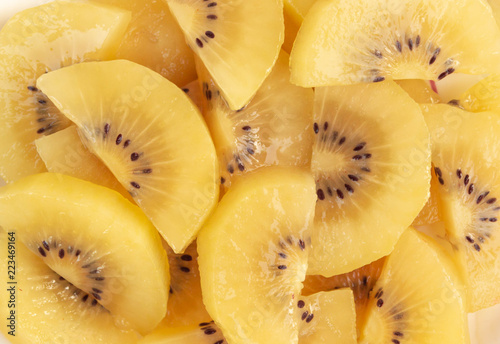 Top view close up golden kiwi fruit slice, fruit concept.