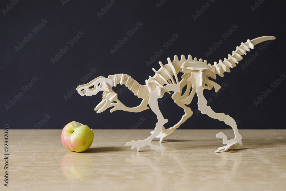 Fototapeta premium wooden toy of VelociRaptor