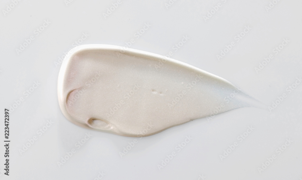 the texture of a foundation liquid, a white background the texture of a foundation liquid, a white background