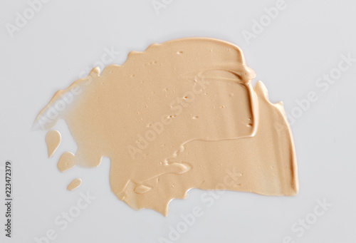 the texture of a foundation liquid, a white background