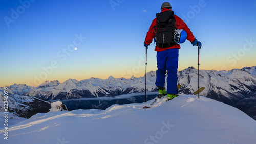 Ski with amazing view of swiss famous mountains in beautiful winter snow Mt Fort. The skituring, backcountry skiing in fresh powder snow.