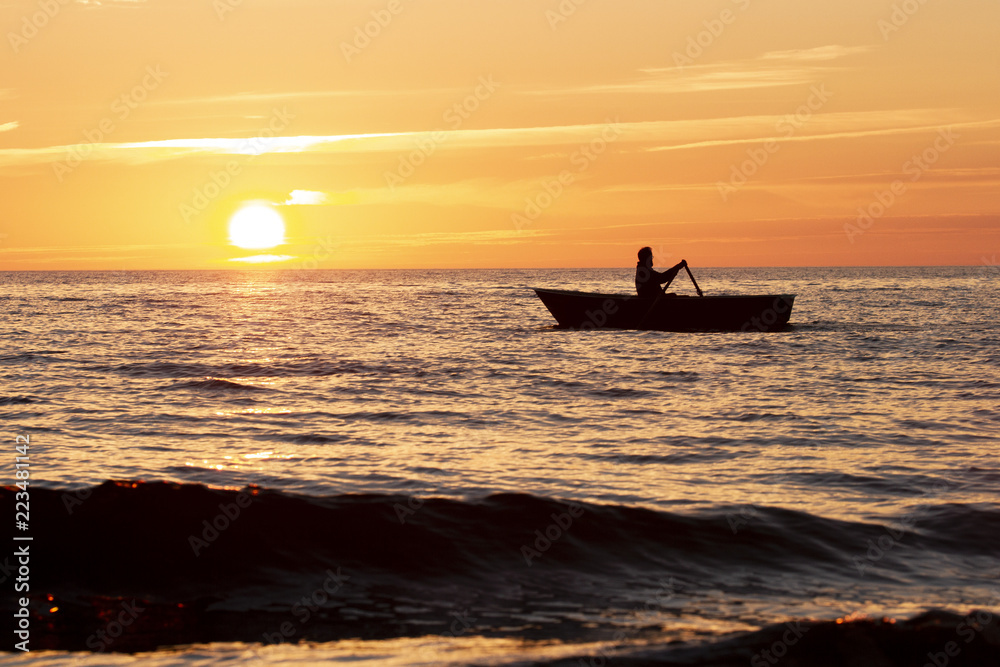 Sunset at the sea and boat