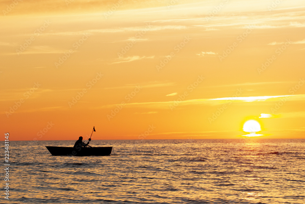 Sunset at the sea and boat