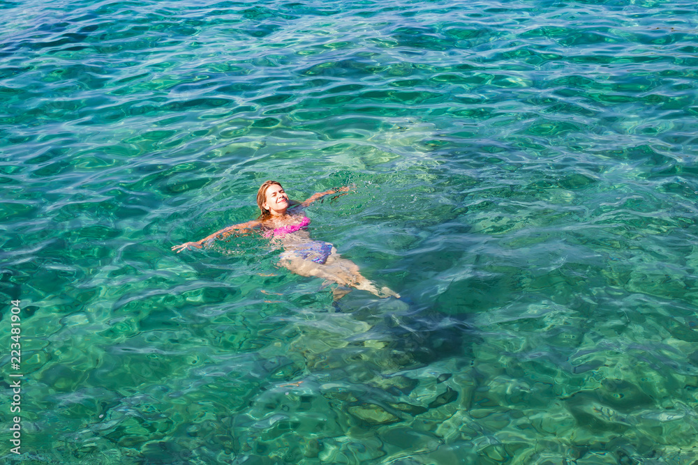 Woman swimming in the sea