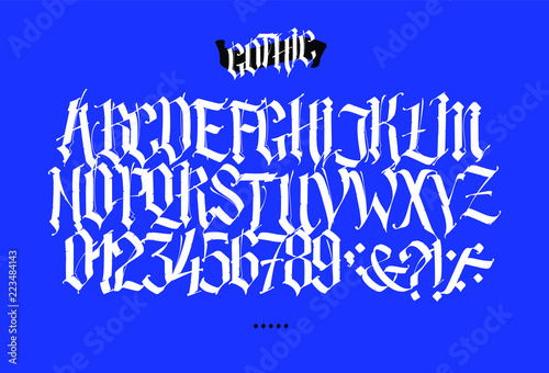 Full Latin alphabet in the Gothic style. Vector. Letters and symbols on a blue background. Calligraphy and lettering. Medieval Latin letters. Elegant font for tattoo. All letters are separate.