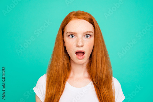 Portrait of nice shocked positive cute bright vivid shiny red st photo