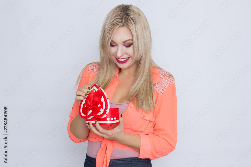 Beauty happy blonde woman with heart gift box. Beauty happy blonde woman with heart gift box.