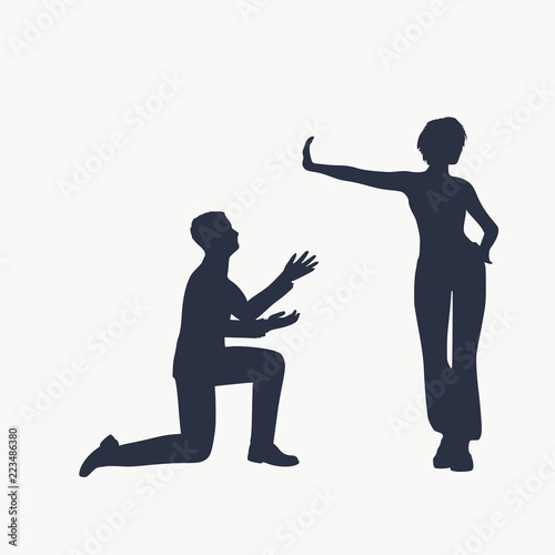 Silhouette of man in prayer pose. Man asking woman to marry or forgive him. A young woman holding her hand in front to show stop gesture