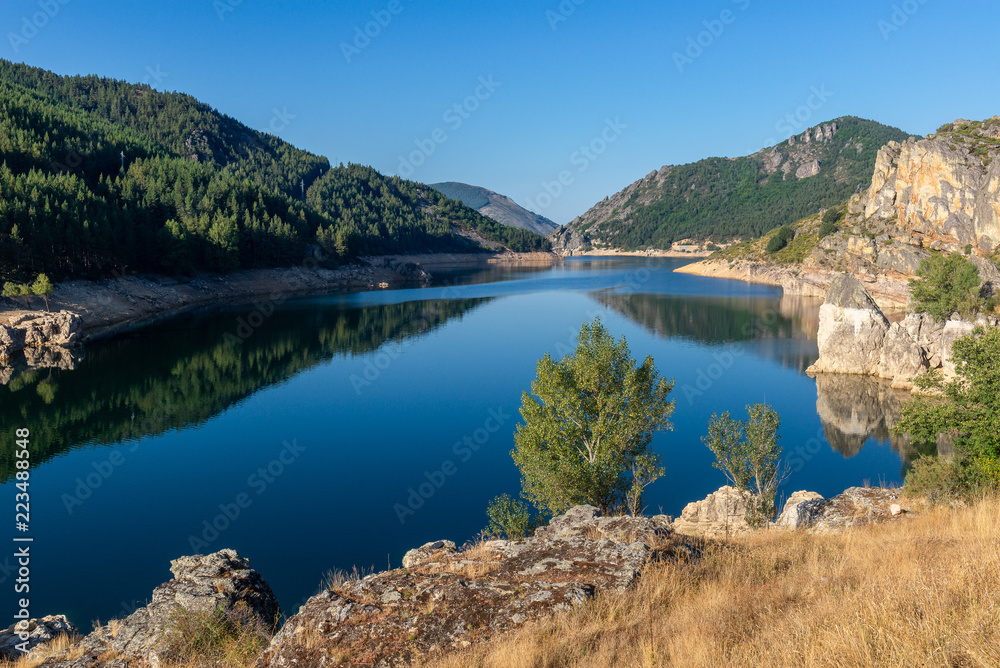 Camporredondo reservoir near Alba de los Cardanos, mountains of Palencia, Spain Camporredondo reservoir near Alba de los Cardanos, mountains of Palencia, Spain
