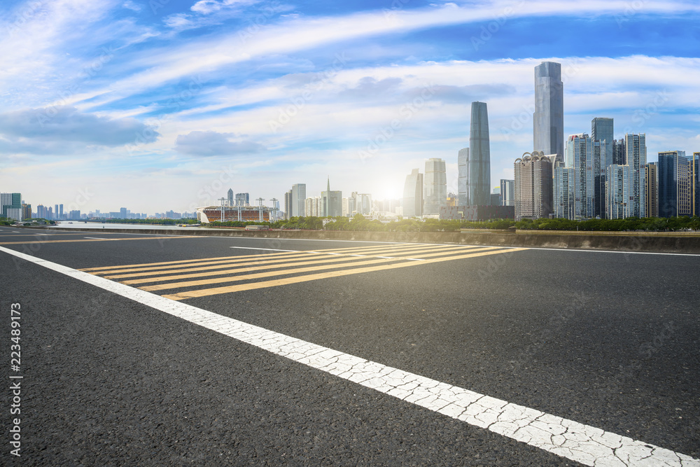 Road pavement and Guangzhou city buildings skyline