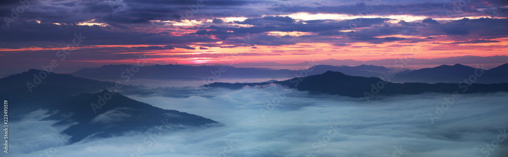 Panorama view Sea of fog on the mountain at dawn in the north of Thailand Panorama view Sea of fog on the mountain at dawn in the north of Thailand