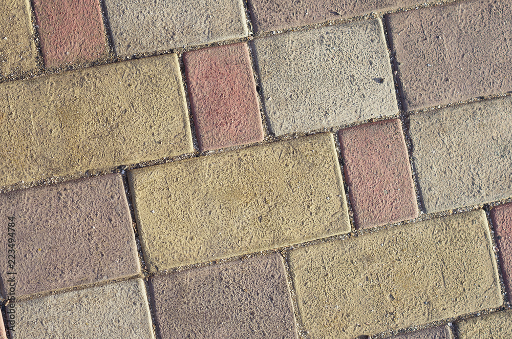 Fototapeta premium paving stone colorful pattern of bricks. Background