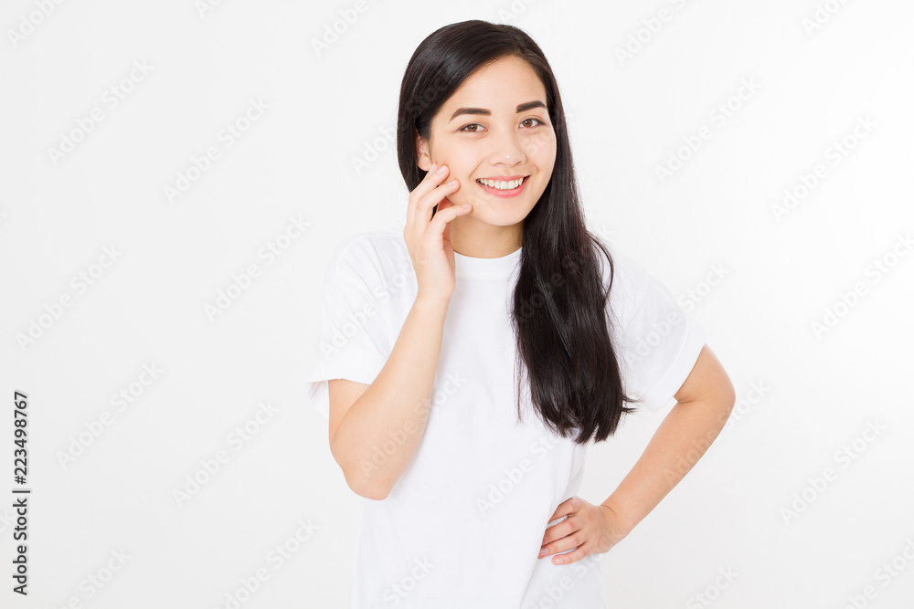 Portrait of smiling Brunette asian girl with long and shiny straight female hair isolated on white background . Beautiful woman korean model with straight hairstyle. Healthy teeth. Copy space. Portrait of smiling Brunette asian girl with long and shiny straight female hair isolated on white background . Beautiful woman korean model with straight hairstyle. Healthy teeth. Copy space.