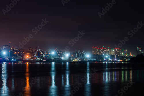 Night view of the port and the city © rostovdriver