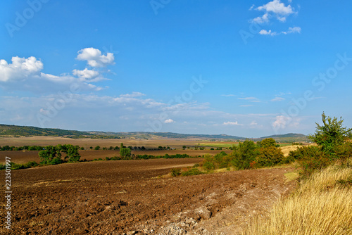 The plowed fields. The old Balkan mountains in the early autumn. Bulgaria.