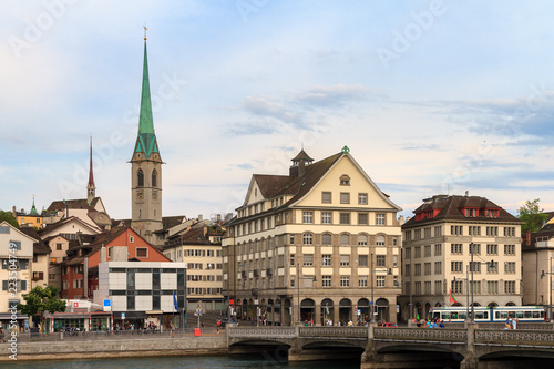 Beautiful cityscape of Zurich, Switzerland, with the Predigerkirche, seen from the shore of the river Limmat in summer   © dennisvdwater