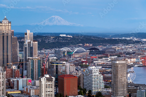 Seattle skyline panorama in blue hour with Mt. Rainier in background as seen from Space Needle Tower, Seattle, Washington, USA. Travel USA. photo