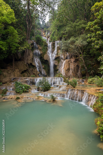 Fototapeta Naklejka Na Ścianę i Meble -  Beautiful view of the main fall at the Tat Kuang Si Waterfalls near Luang Prabang in Laos.