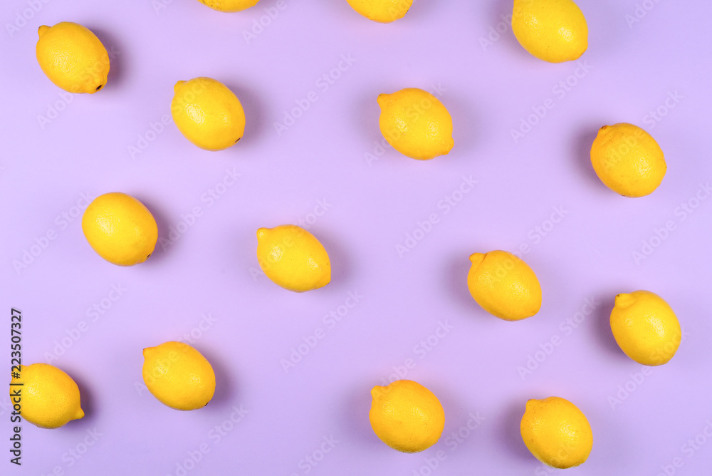 Lemon isolated on lilac background. Space for test or design. Lemon isolated on lilac background. Space for test or design.