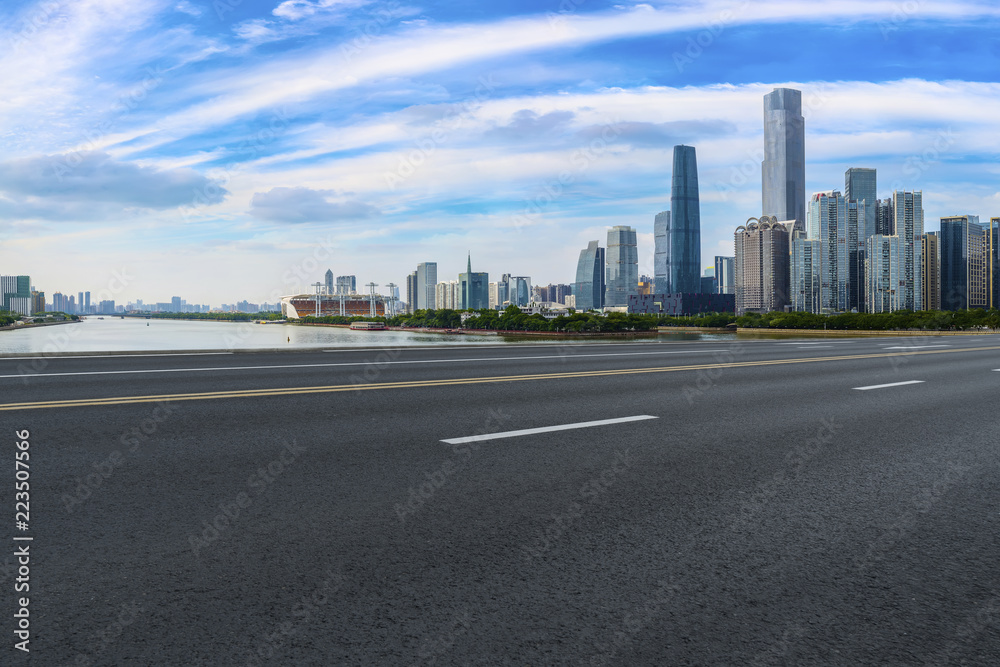 Road pavement and Guangzhou city buildings skyline