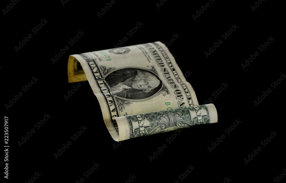 One dollar bill isolated on black background One dollar bill isolated on black background