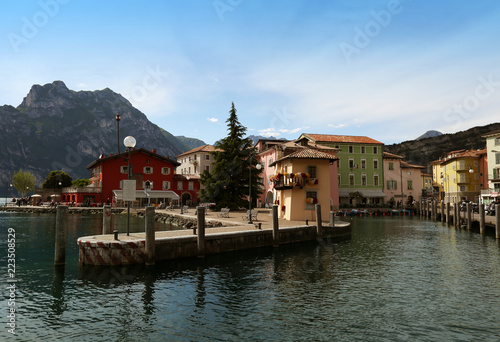 Italy. Riva del Garda. Torbole. View of the boat pier. A beautiful sunny day