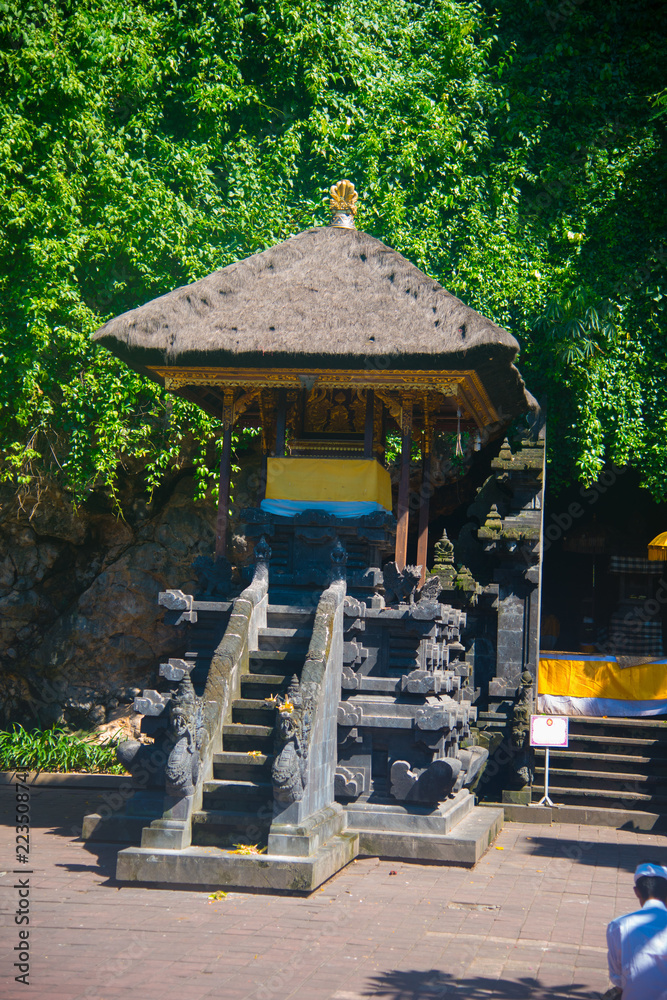 Obraz premium Goa Lawah Temple in Bali, Indonesia. Bali is an Indonesian island and known as a tourist destination. Majority of people in Bali believe in the Hindu religion.