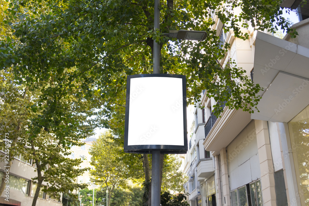 Mock up. Advertising template on the pole in street - obrazy, fototapety, plakaty 